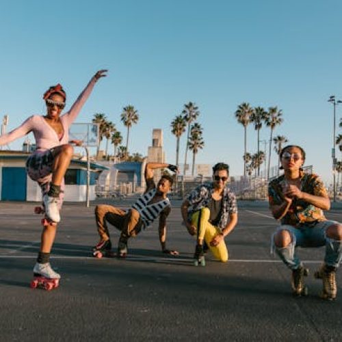 A lively group enjoying roller skating under the sun at Venice Beach